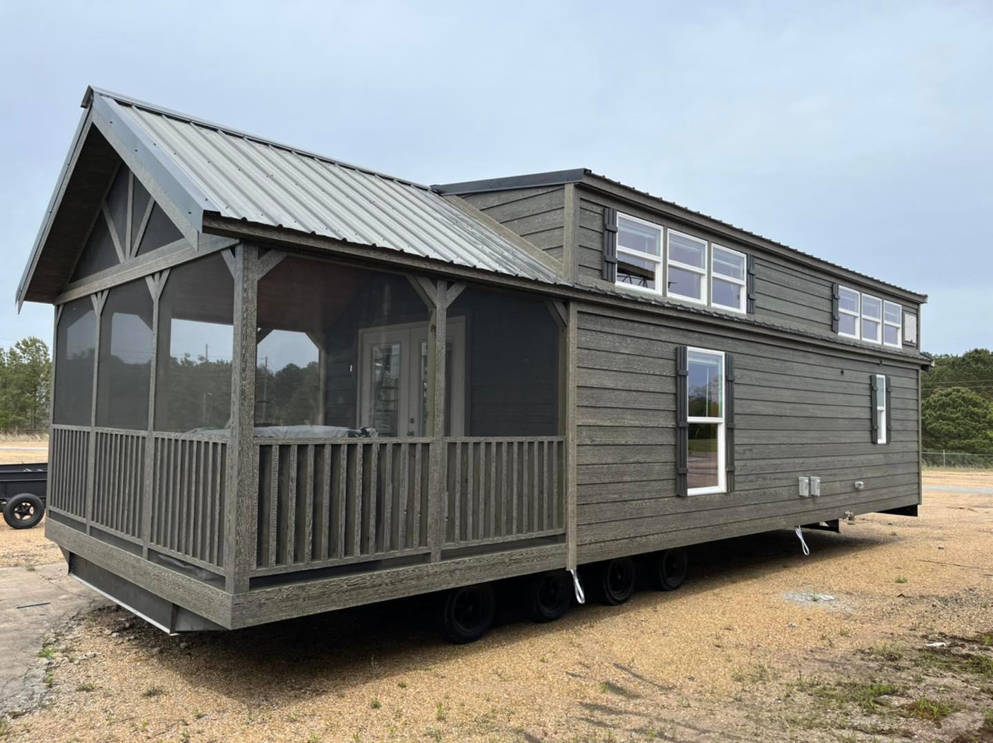 ACC-02 — exterior with screened porch and loft dormers