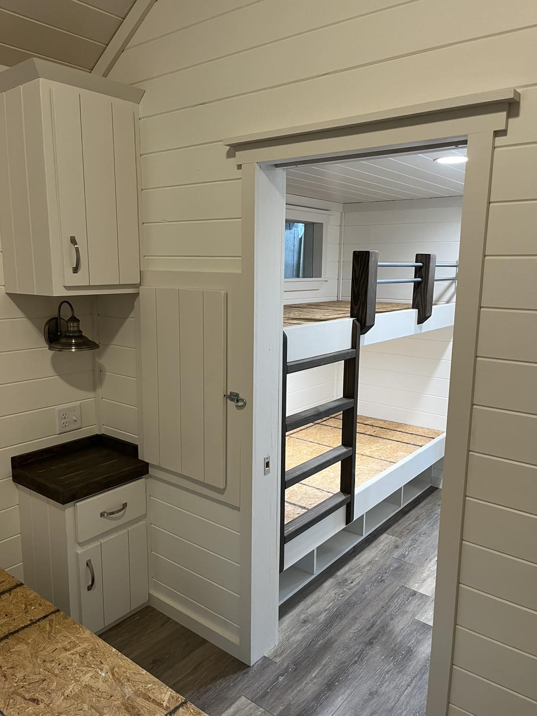 ACC-02 — private bunk room with built-in bunks and storage