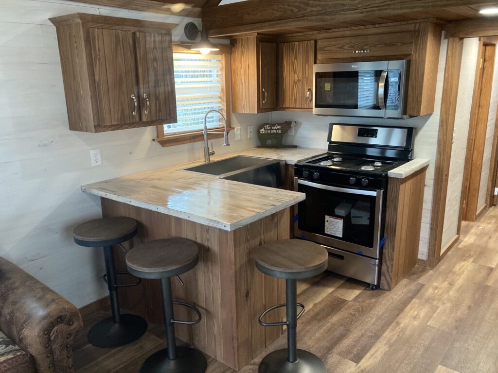 ACC-04 — kitchen with breakfast bar and stainless appliances