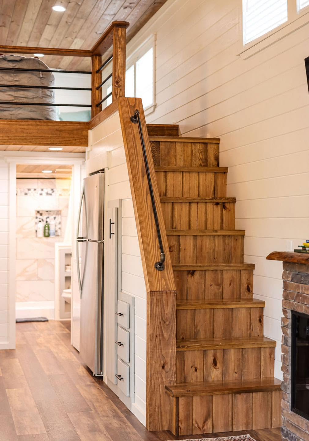 Kelsey 1.0 — wood stairway up to the loft