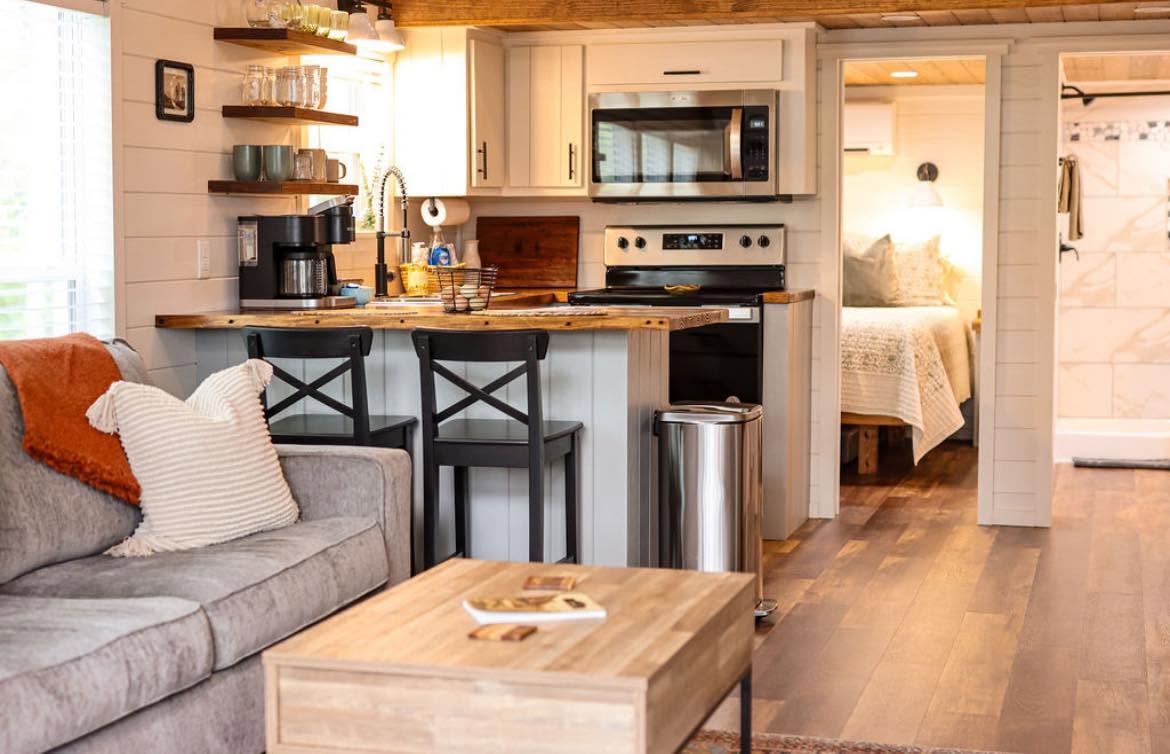 Kelsey 1.0 — open living, kitchen and private bedroom