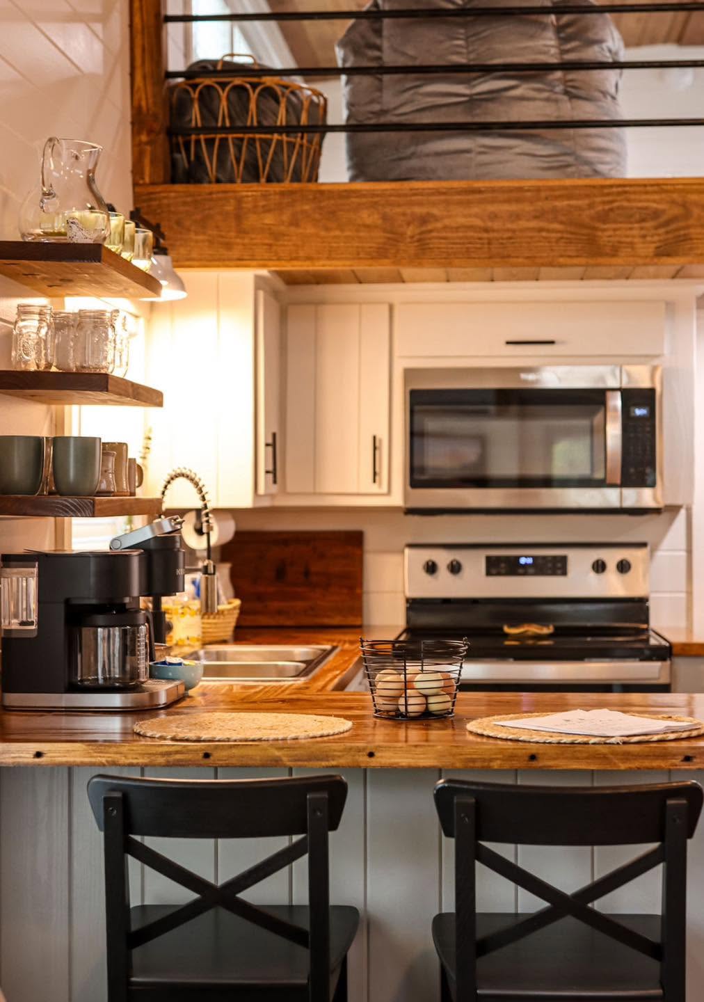 Kelsey 1.0 — kitchen with butcher-block island and breakfast bar